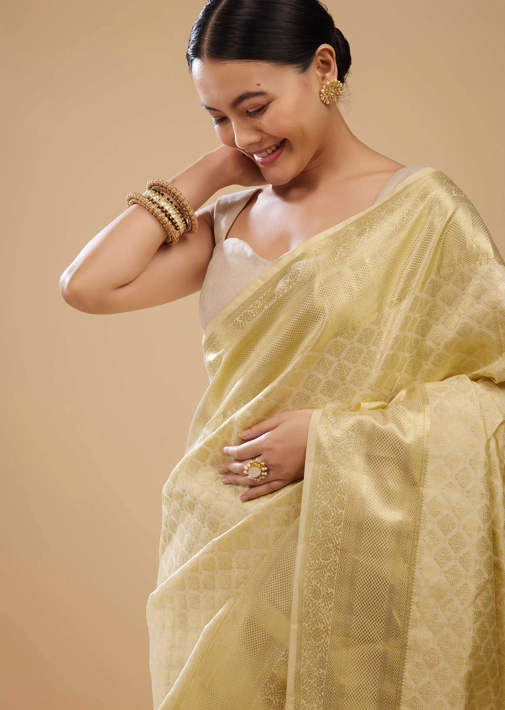 Cream White Kanjivaram Silk Saree In Intricate Weave