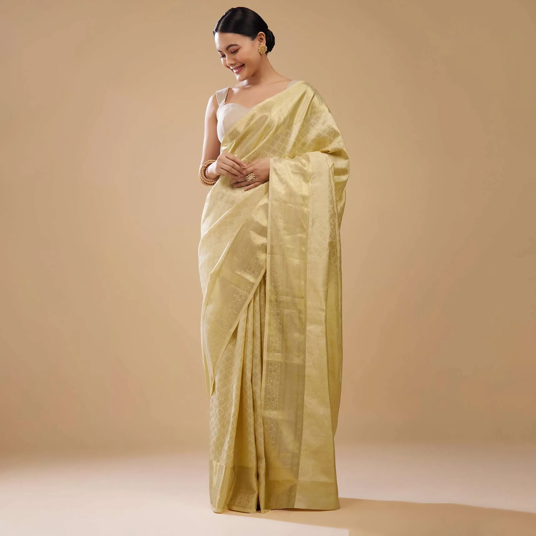 Cream White Kanjivaram Silk Saree In Intricate Weave
