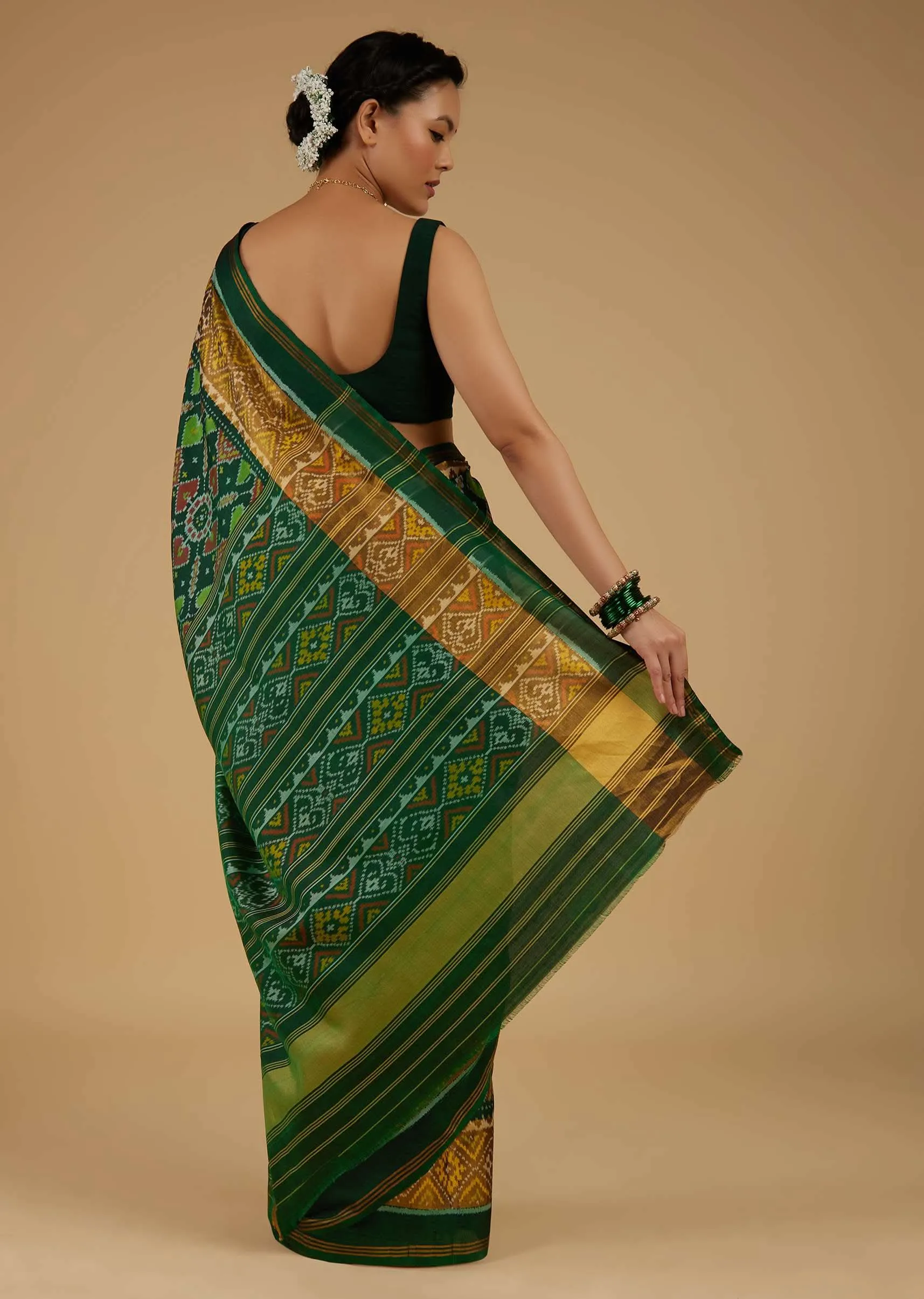 Deep Green Saree In Silk With Ikat Weave Patola Work
