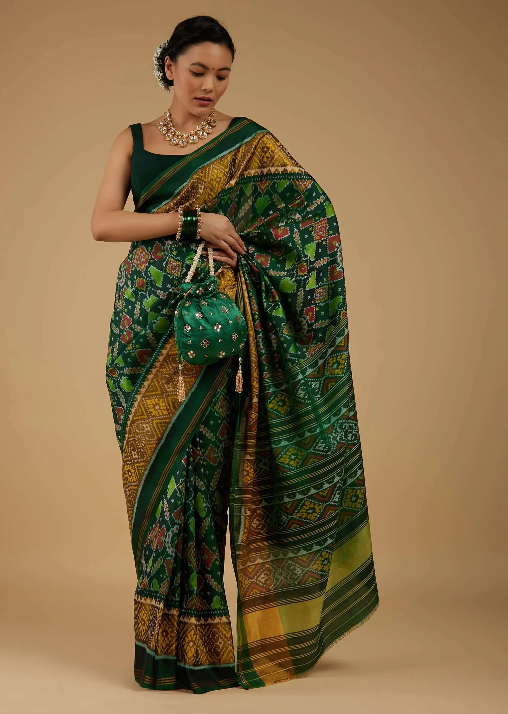 Deep Green Saree In Silk With Ikat Weave Patola Work