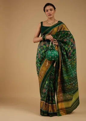 Deep Green Saree In Silk With Ikat Weave Patola Work